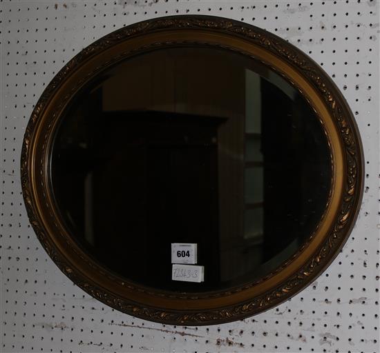Gilt oval frame wall mirror(-)